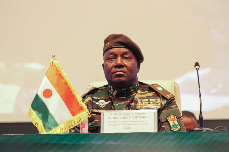 FILE PHOTO: Niger's Junta leader General Abdourahamane Tiani attends the first ordinary summit of heads of state and governments of the Alliance of Sahel States (AES) in Niamey, Niger July 6, 2024. REUTERS/ Mahamadou Hamidou/File Photo
الجنرال عبد الرحمن تياني زعيم المجلس العسكري في النيجر (رويترز)
