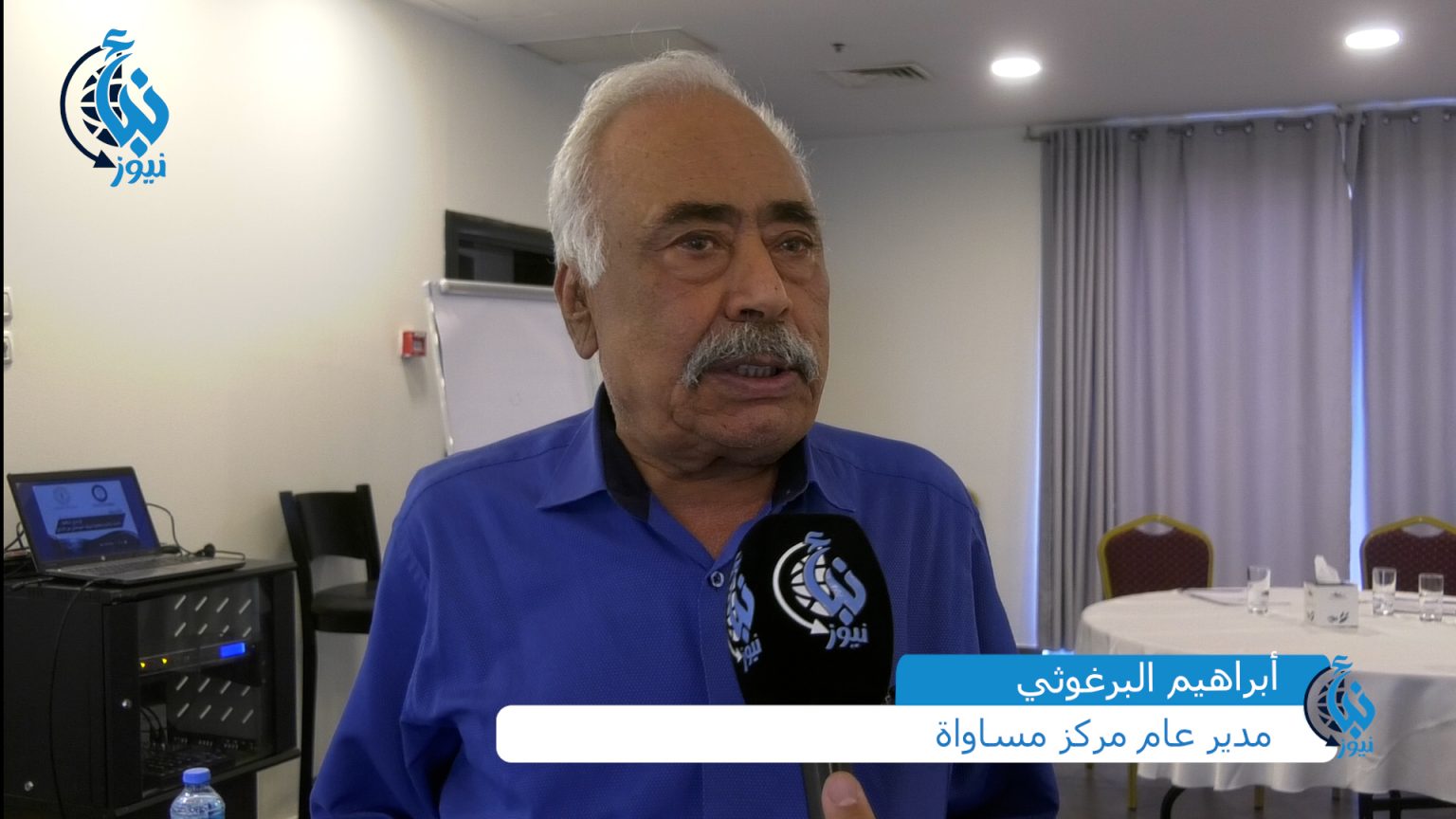 صورة المحامي إبراهيم البرغوثي في مقابلة سابقة لوكالة نبأ الإخبارية